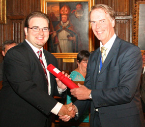 Matthew Hough receives the Roberts Prize from IPEM President Peter Jarritt
