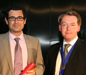 Costas Arvantis receives his prize from Steve Keevil, President of IPEM, at MPEC 2014.