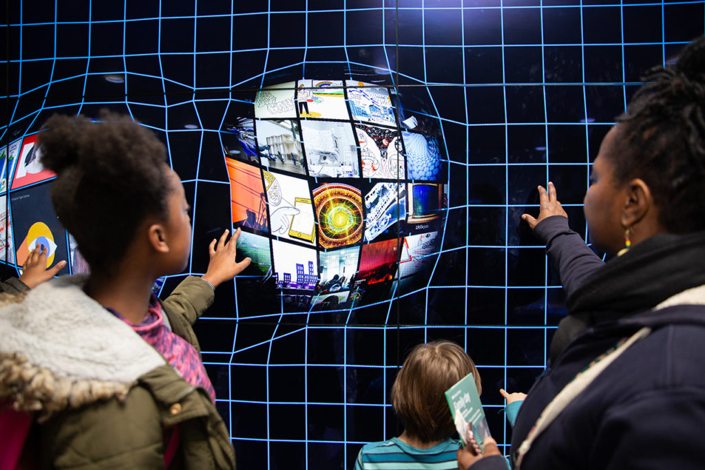 Members of the public exploring physics at IOP’s flagship King’s Cross building