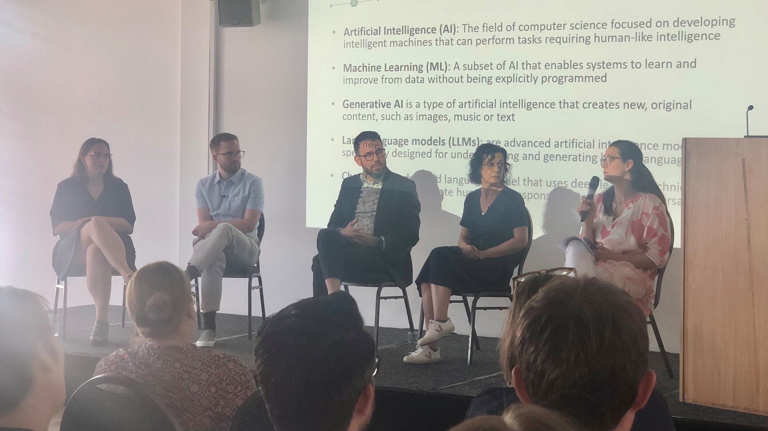 A panel of four industry experts at IOP Publishing's annual colleague conference, PubCon. From left to right: Lauren Flintoft, Research Integrity Officer at IOP Publishing; Dr Matt Hodgson, Associate Lecturer at the University of York; Dustin Smith, Co-founder and President of Hum; Fabienne Michaud, Product Manager at Crossref; and session chair, Kim Eggleton, Head of Research Integrity and Peer Review at IOP Publishing.